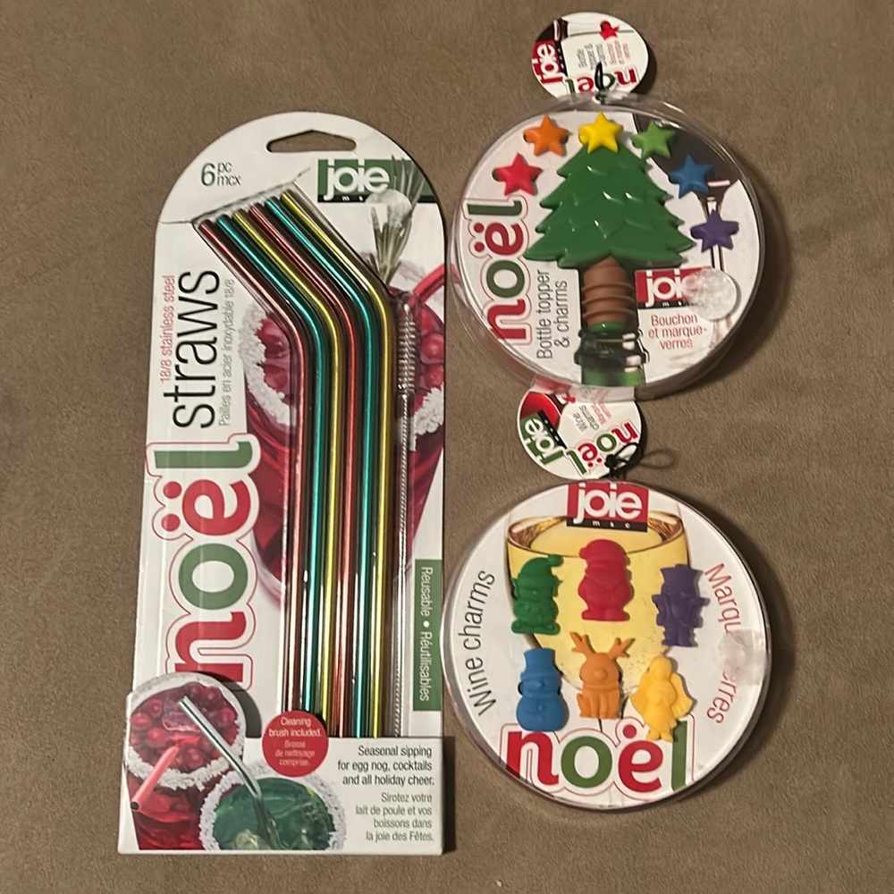 New In Package: 6pc Straws w/Brush, Bottle Topper w/ 12 Glass Charms.